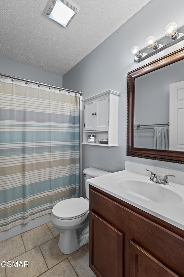 923 Red Oak Ln, Dandridge, TN 37725 - full bathroom with vanity, a textured ceiling, tile patterned floors, and a shower with curtain