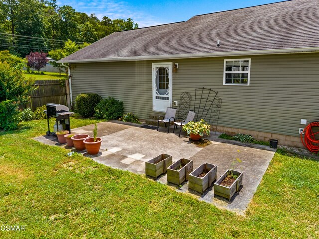 923 Red Oak Ln, Dandridge, TN 37725 - back of house featuring a patio area and roof with shingles