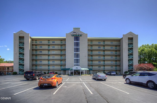 3215 N River Rd Unit 103, Pigeon Forge, TN 37863 - view of apartment building / complex with uncovered parking