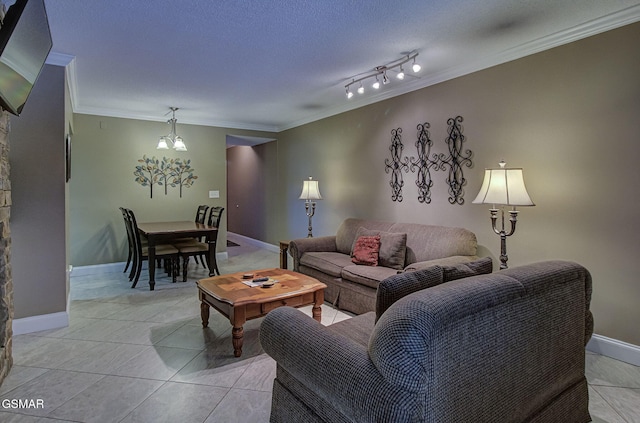 3215 N River Rd Unit 103, Pigeon Forge, TN 37863 - living area with ornamental molding, light tile patterned floors, a chandelier, and baseboards