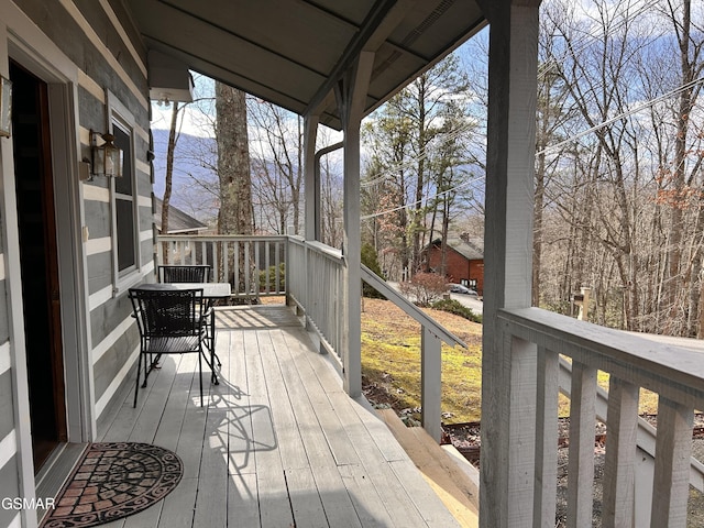 wooden deck featuring covered porch