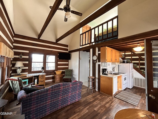 living room featuring beam ceiling, ceiling fan, dark hardwood / wood-style flooring, and high vaulted ceiling