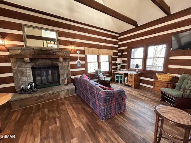 living room with dark hardwood / wood-style flooring, a fireplace, high vaulted ceiling, and beamed ceiling