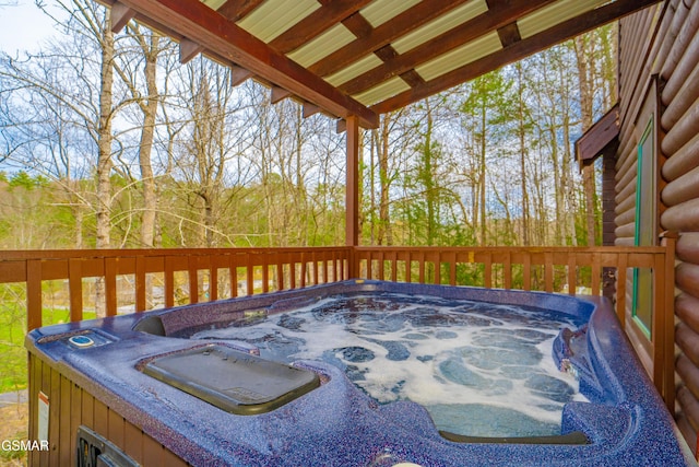 deck with a hot tub