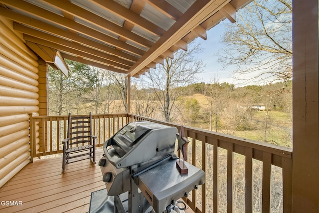 wooden deck featuring grilling area