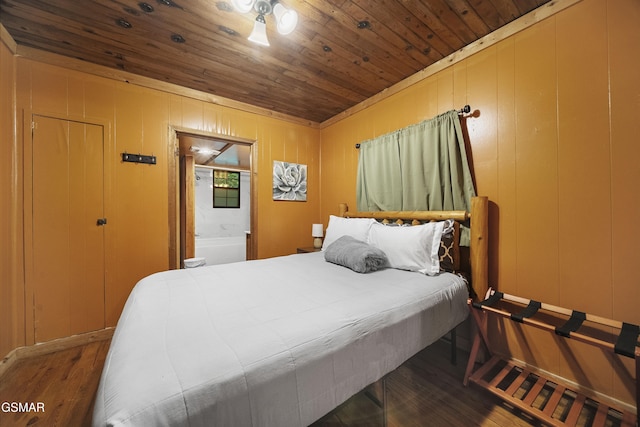 215 Lovers Ln, Townsend, TN 37882 - bedroom featuring wood finished floors, wooden ceiling, and ensuite bathroom