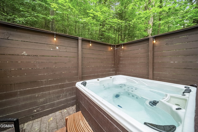 215 Lovers Ln, Townsend, TN 37882 - view of patio / terrace with a hot tub