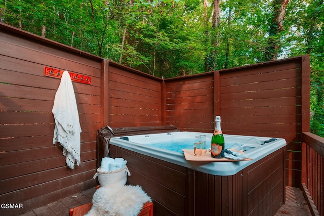 view of patio with a hot tub