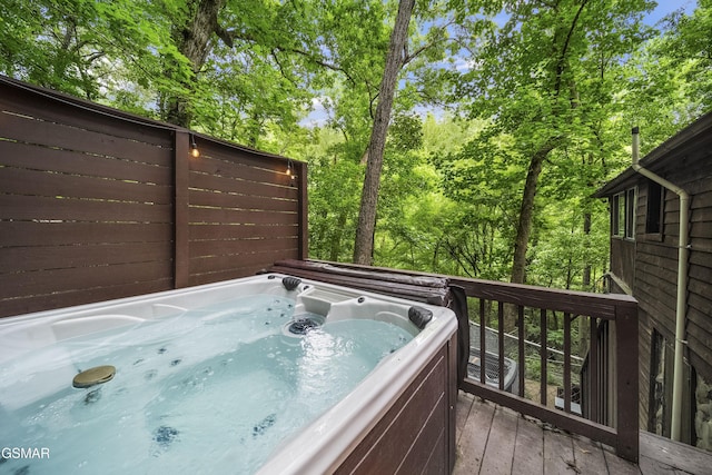215 Lovers Ln, Townsend, TN 37882 - wooden deck featuring a hot tub