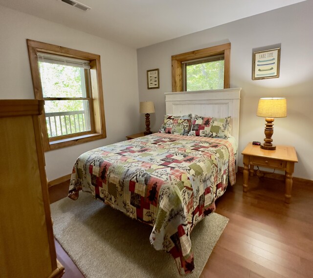 bedroom featuring hardwood / wood-style floors