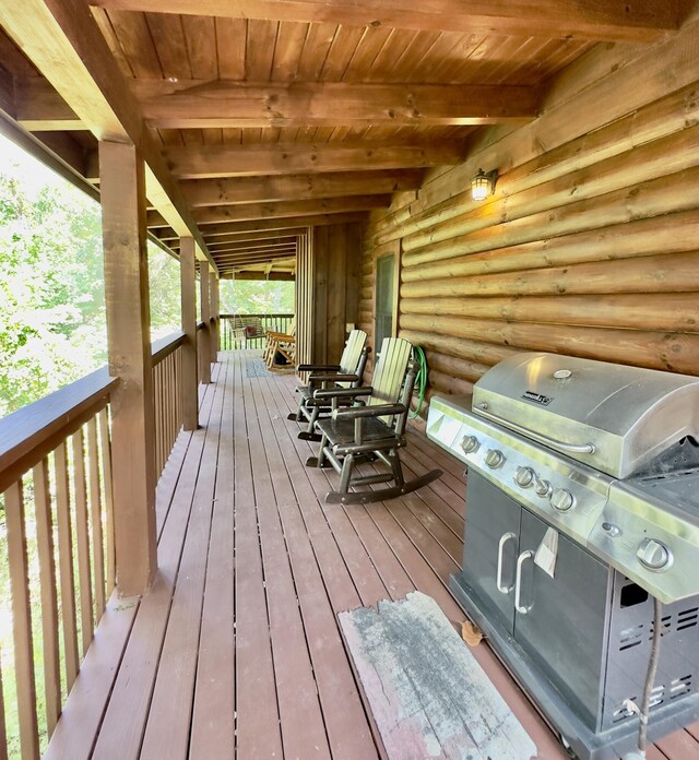 wooden terrace with grilling area