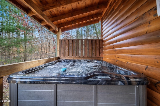 exterior space featuring a hot tub