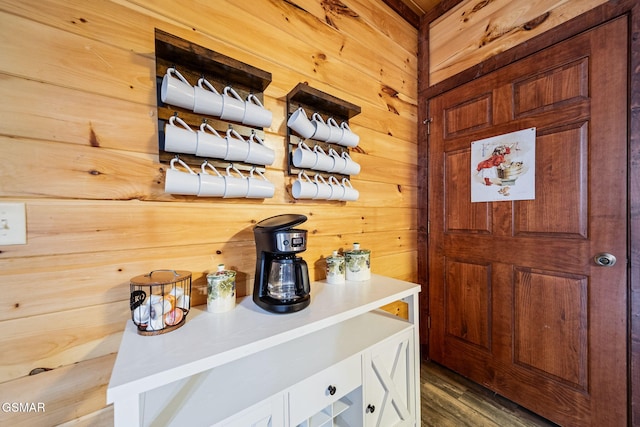 interior space with wood walls and wood-type flooring