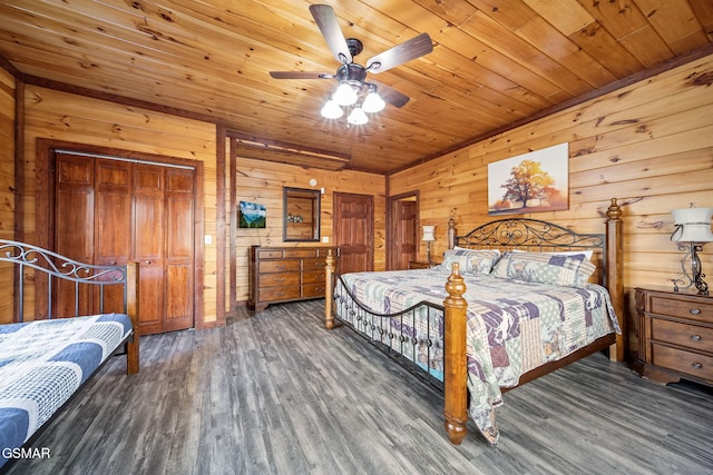 bedroom featuring wooden ceiling, a closet, ceiling fan, dark hardwood / wood-style flooring, and wooden walls