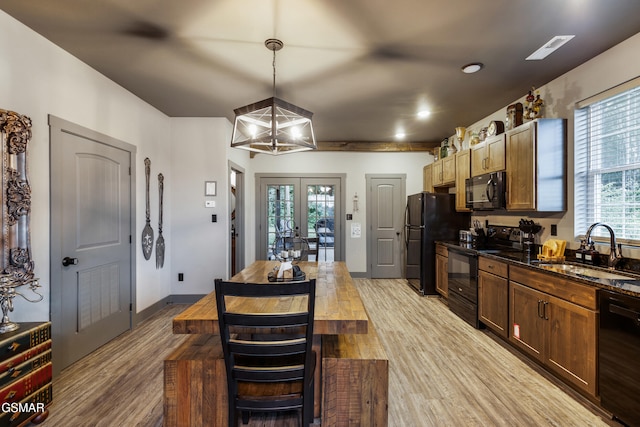 970 Douglas Dam Rd Unit 6, Kodak, TN 37764 - kitchen featuring black appliances, light wood finished floors, hanging light fixtures, french doors, and recessed lighting