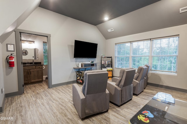 970 Douglas Dam Rd Unit 6, Kodak, TN 37764 - living area with vaulted ceiling and light wood finished floors