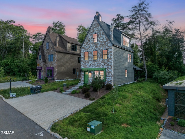970 Douglas Dam Rd Unit 6, Kodak, TN 37764 - view of front facade with a chimney and stone siding