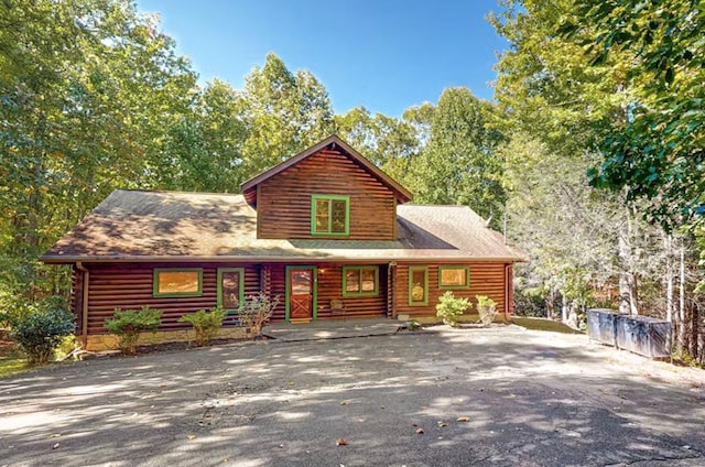 view of log cabin