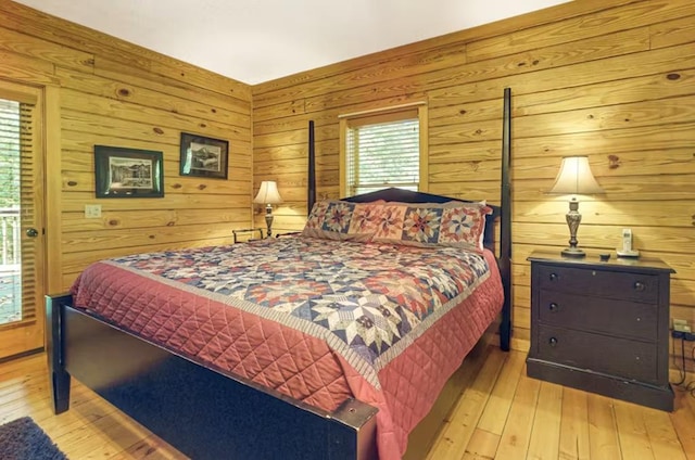 bedroom with light hardwood / wood-style flooring