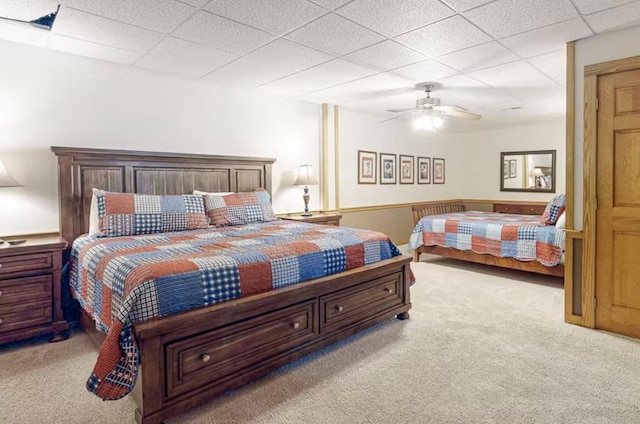 bedroom with light colored carpet and ceiling fan