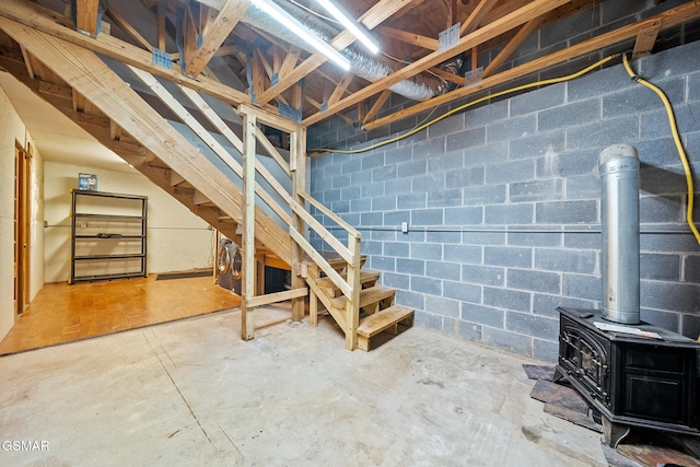 basement featuring a wood stove