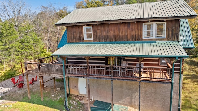 view of front of property with a wooden deck