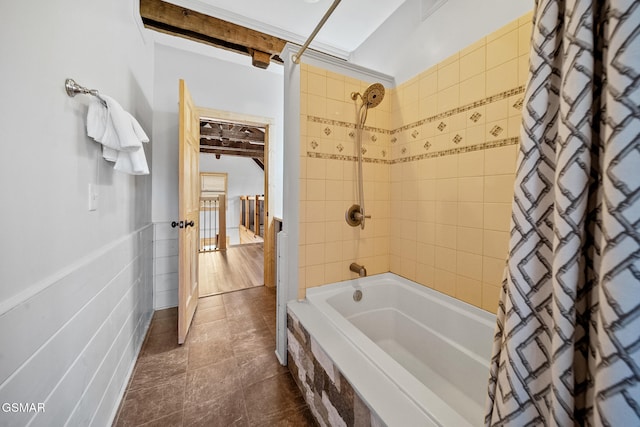 bathroom featuring shower / bathtub combination with curtain