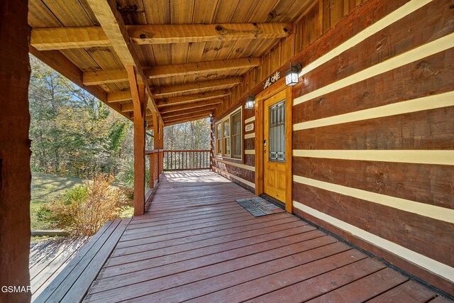 deck with covered porch