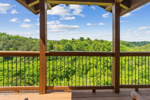 2083 Kerr Rd, Sevierville, TN 37876 - wooden terrace with a forest view
