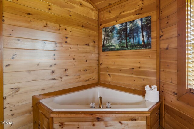 2083 Kerr Rd, Sevierville, TN 37876 - full bath featuring a garden tub and wooden walls