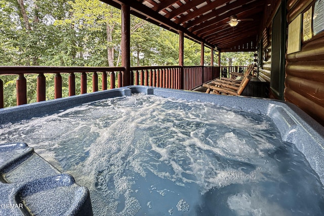 3529 Peggy Ln, Pigeon Forge, TN 37863 - wooden deck with a hot tub and a ceiling fan