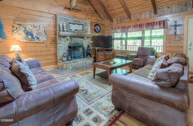 3529 Peggy Ln, Pigeon Forge, TN 37863 - living room featuring wood walls, wood ceiling, and a stone fireplace