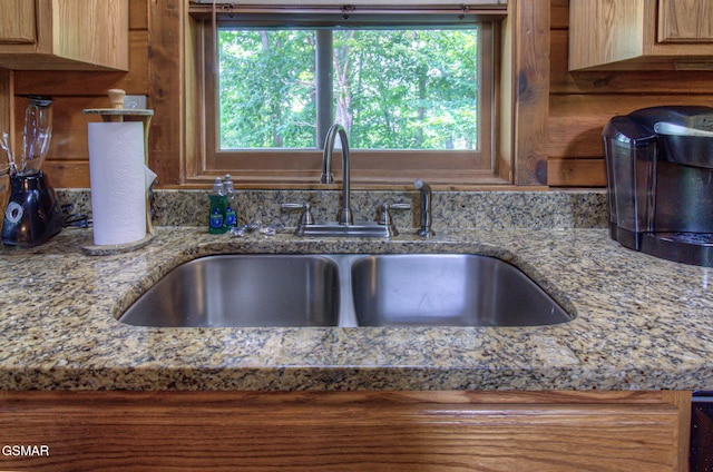 3529 Peggy Ln, Pigeon Forge, TN 37863 - kitchen view of a sink and light stone countertops