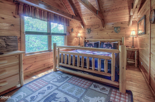 3529 Peggy Ln, Pigeon Forge, TN 37863 - bedroom featuring hardwood / wood-style floors, wooden walls, and wood ceiling