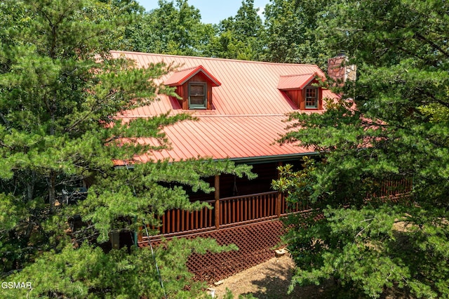 3529 Peggy Ln, Pigeon Forge, TN 37863 - rustic home featuring a chimney and metal roof