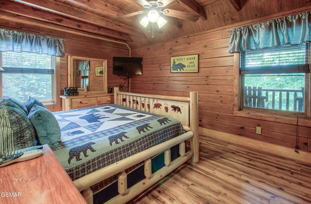 3529 Peggy Ln, Pigeon Forge, TN 37863 - bedroom with wooden walls, wood ceiling, and wood finished floors
