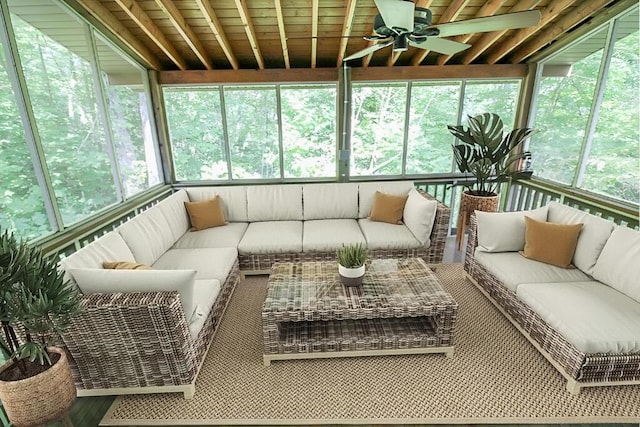 sunroom with a ceiling fan