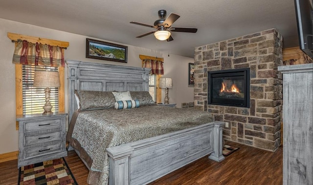 1106 Anastasia Way, Gatlinburg, TN 37738 - bedroom with wood finished floors, a fireplace, and ceiling fan