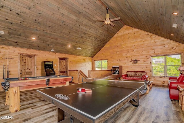 game room with wooden walls, wood finished floors, pool table, vaulted ceiling, and wooden ceiling