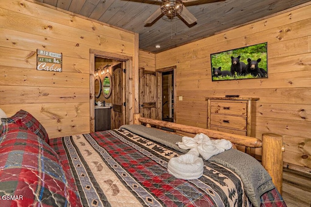 bedroom featuring wooden walls and wooden ceiling