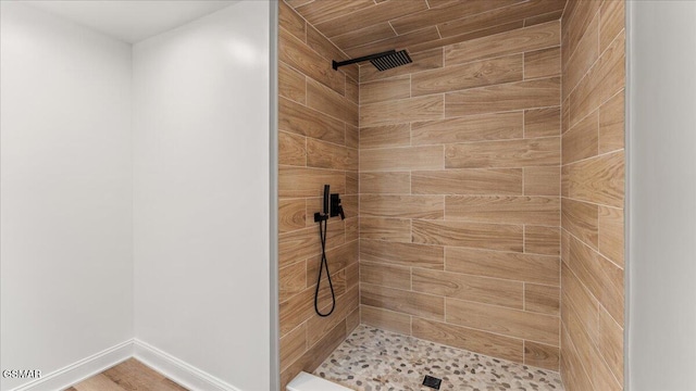 1204 Piney Mountain Rd, Newport, TN 37821 - bathroom featuring a tile shower and baseboards