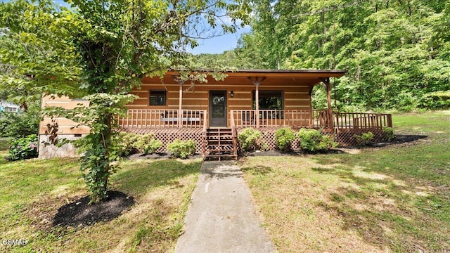 1204 Piney Mountain Rd, Newport, TN 37821 - view of front facade with covered porch and a front lawn
