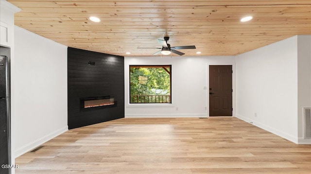 1204 Piney Mountain Rd, Newport, TN 37821 - unfurnished living room with wooden ceiling, a ceiling fan, a large fireplace, light wood-style floors, and recessed lighting