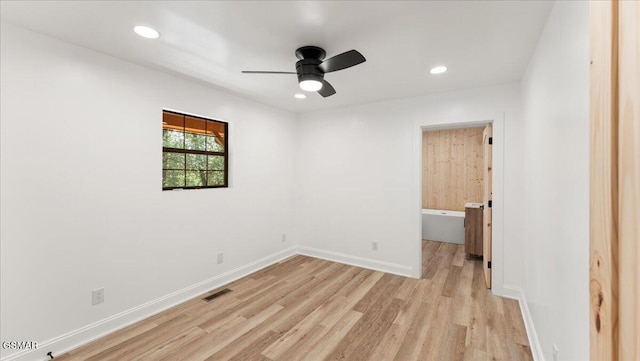 1204 Piney Mountain Rd, Newport, TN 37821 - unfurnished bedroom with light wood finished floors, recessed lighting, and a ceiling fan