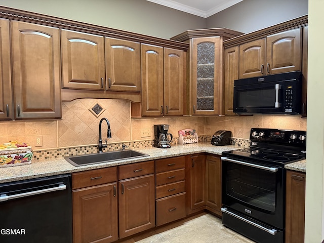 915 Fine Glen Dr, Sevierville, TN 37862 - kitchen featuring black appliances, a sink, ornamental molding, glass insert cabinets, and decorative backsplash