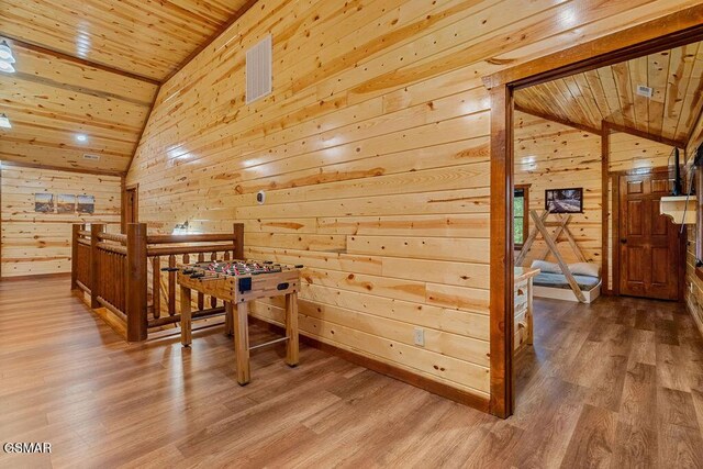 2864 Owens Ridge Way, Sevierville, TN 37876 - corridor with wood ceiling, vaulted ceiling, wood walls, and wood finished floors