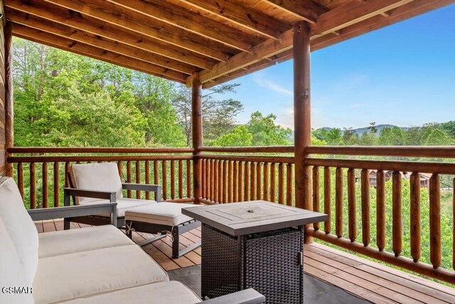 2864 Owens Ridge Way, Sevierville, TN 37876 - wooden terrace with an outdoor hangout area