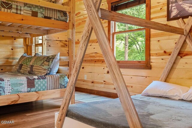 2864 Owens Ridge Way, Sevierville, TN 37876 - bedroom with wooden walls and wood finished floors