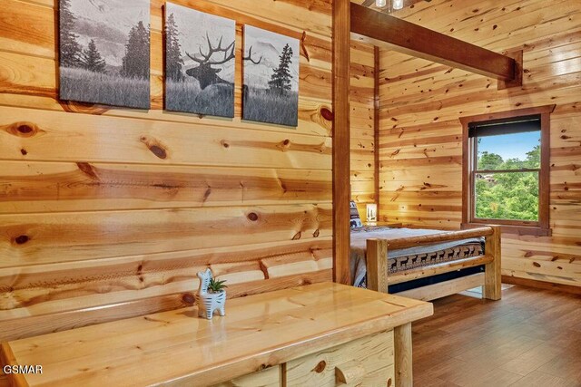 2864 Owens Ridge Way, Sevierville, TN 37876 - bedroom with wooden walls and wood finished floors