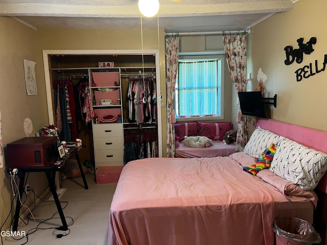 206 Bunker Ln, Oak Ridge, TN 37830 - carpeted bedroom featuring a closet and ornamental molding
